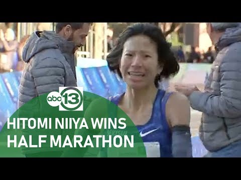 Hitomi Niiya speaks after becoming the women&#039;s winner of the Aramco Half Marathon